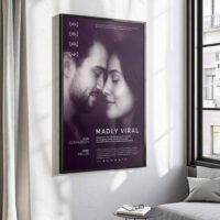 Personalized couple print leaning at an angle against a modern wall