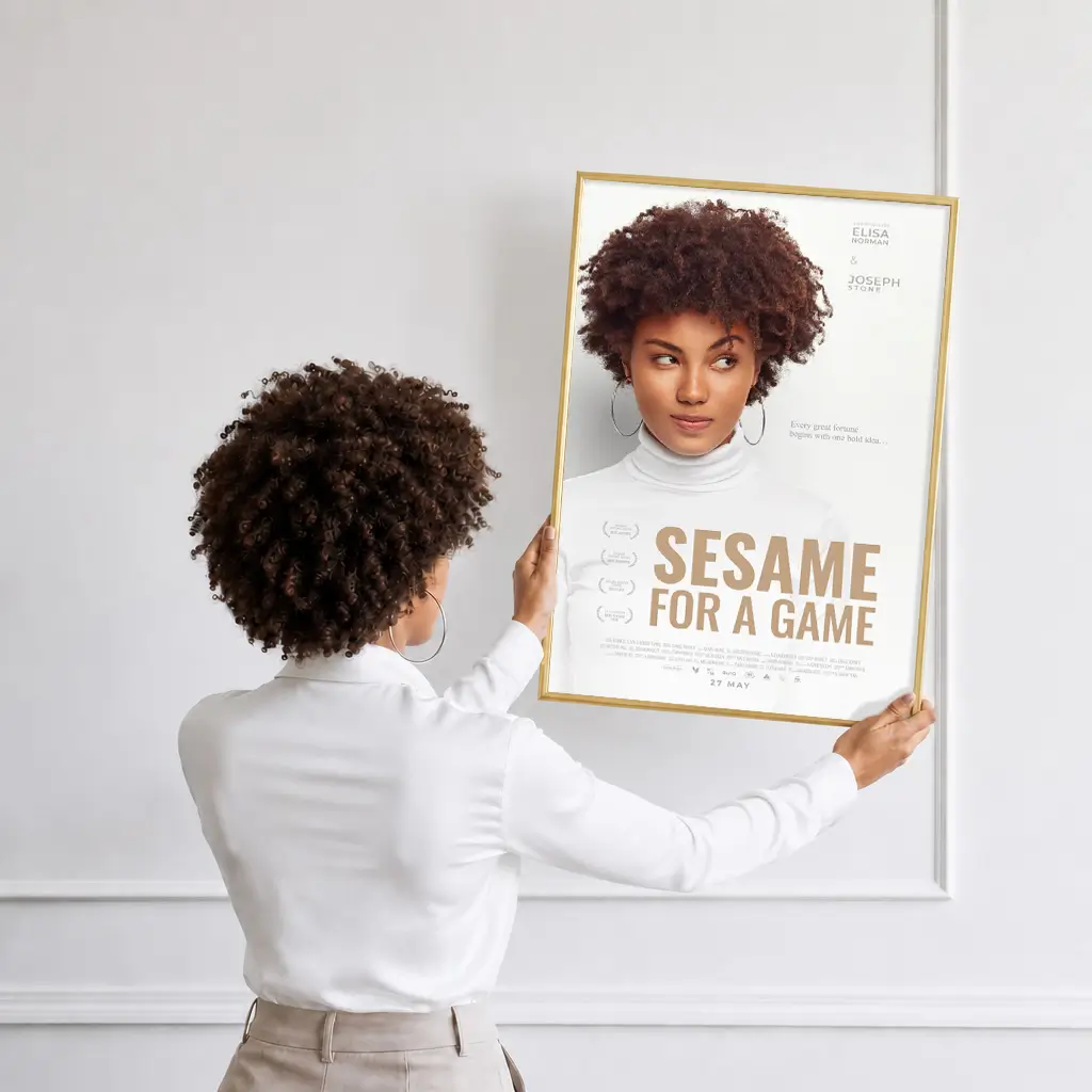 Personalized film poster gift that woman hangs on a wall